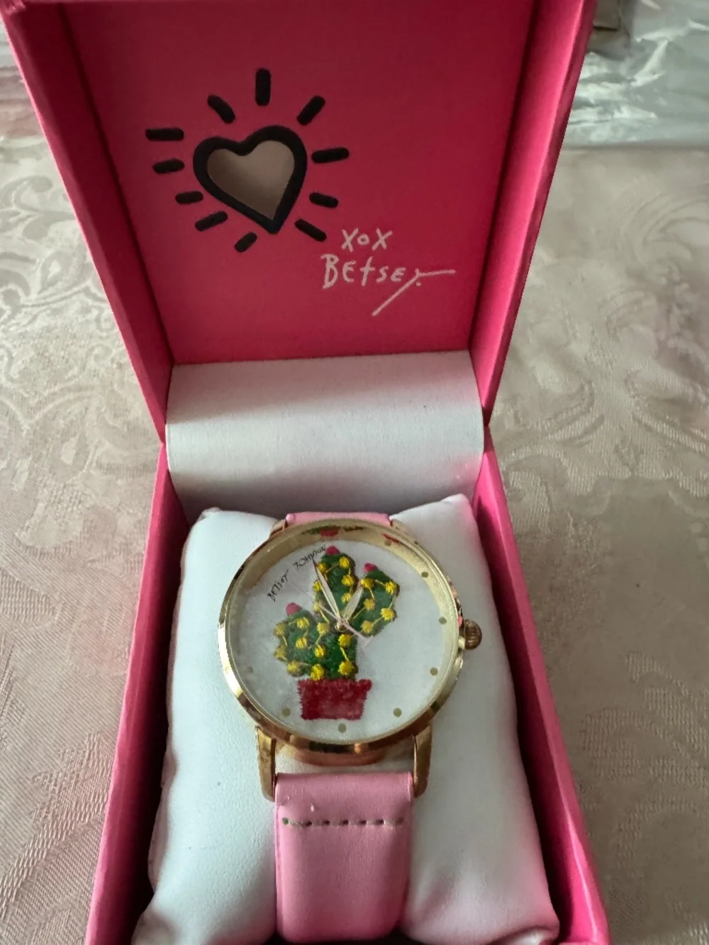 NIB Betsey Johnson wristwatch features a whimsical embroidered cactus dial